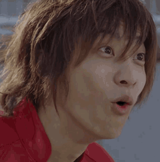 a close up of a person with their mouth open