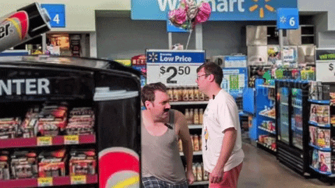 two men standing in front of a sign that says low price