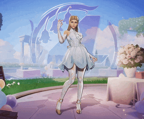 a woman in a white dress is standing in front of a building with the letter v on it