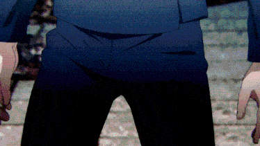 a close up of a person 's pants with a blue shirt and black pants