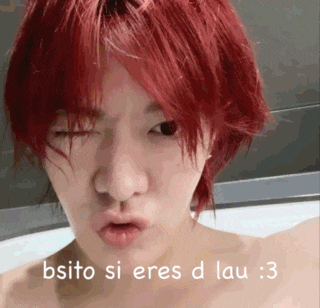 a man with red hair is making a funny face and the words bsito si eres d lau : 3 are below him