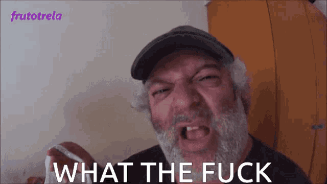 a man with a beard says what the fuck in front of fruitotrela