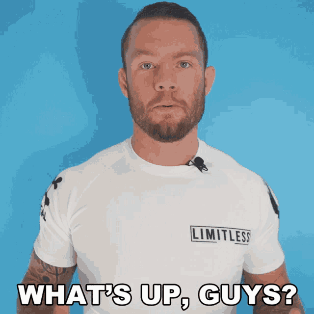 a man wearing a shirt that says limitless on it