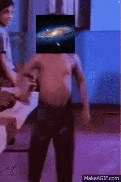 a man without a shirt has a picture of a galaxy above his head