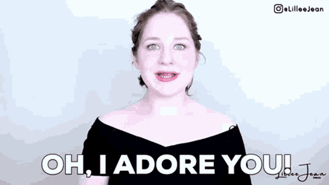 a woman is making a face and saying `` oh , i adore you ! ''