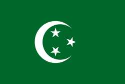 a green flag with three white stars and a crescent moon