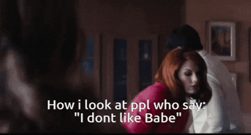 a woman in a red dress says how i look at ppl who say i dont like babe