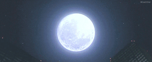 a full moon is shining brightly in the dark sky