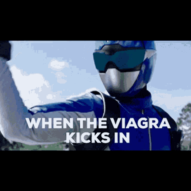 a man in a blue and silver superhero costume says " when the viagra kicks in "