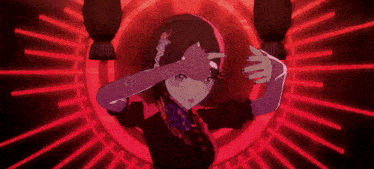 a girl in a black and purple dress stands in front of a red circle