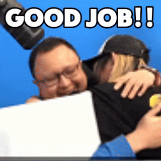 a man hugging another man with the words " good job " written above them