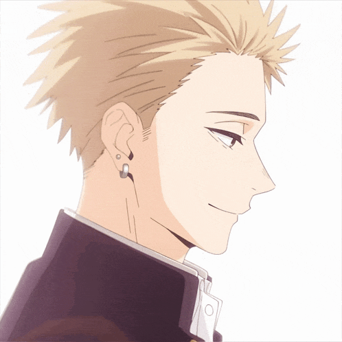 a close up of a man 's face with earrings on his ear