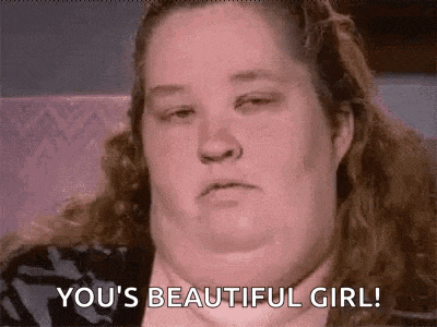 a woman is sitting in a chair with her eyes closed and says `` you 're beautiful girl '' .