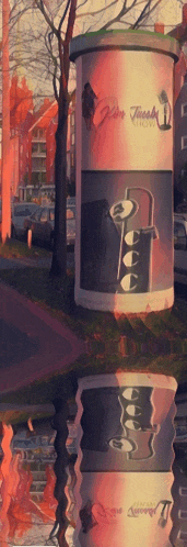 a reflection of a pillar with a sign that says " film threads "