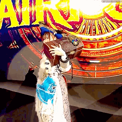 a woman in a costume is holding a briefcase on her back .