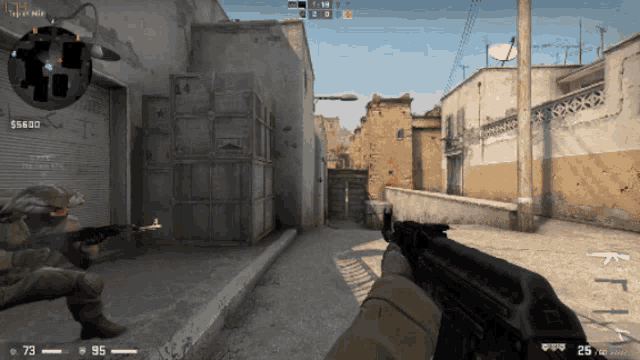 a person holding a gun in a video game with the numbers 75 and 73 on the screen