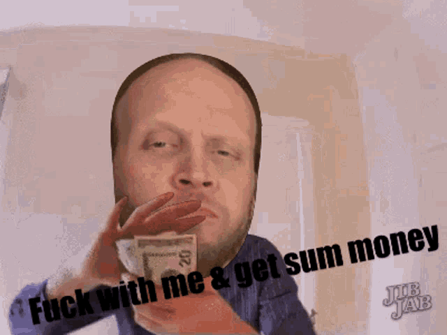 a man with a beard is holding a stack of money and says fuck with me & get sum money