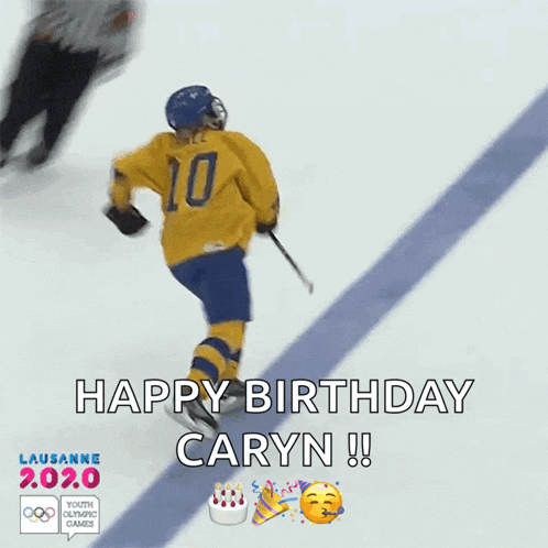 a hockey player is celebrating his birthday with a birthday cake