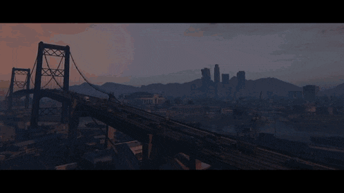 a bridge over a body of water in a city