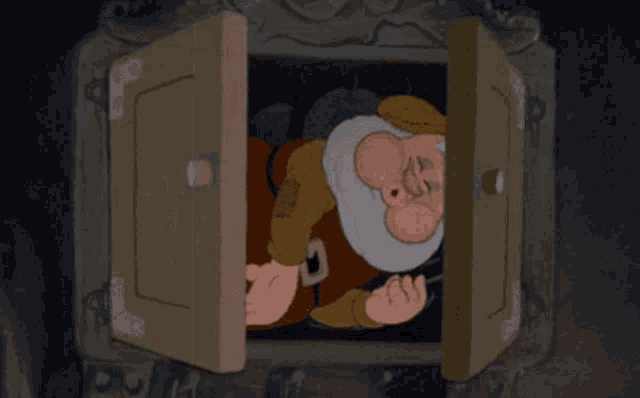 a cartoon character with a beard is looking out of a window