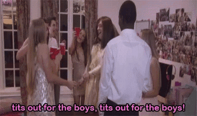 a group of people are dancing in a room with the words tits out for the boys written on the bottom .