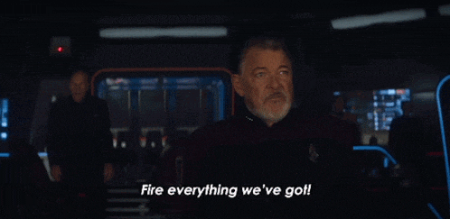 a man with a beard says fire everything we 've go