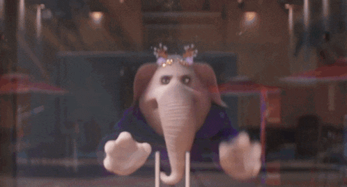 a cartoon elephant is standing in a glass container .