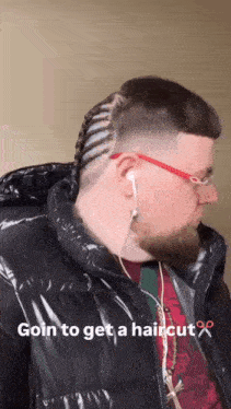 a man wearing headphones and a braided haircut with the words goin to get a haircut on the bottom