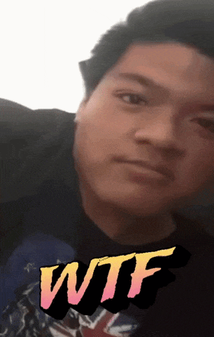 a close up of a man 's face with the word wtf on the bottom