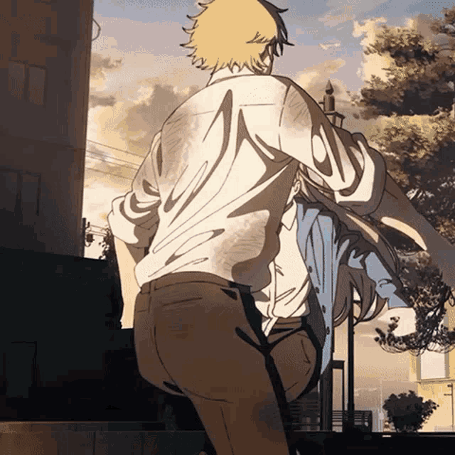 a man is carrying a woman in his arms in a cartoon