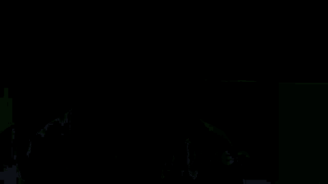 a man with a bald head is talking in a foreign language