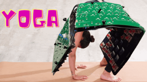 a woman is doing yoga on a mat with the word yoga in pink letters