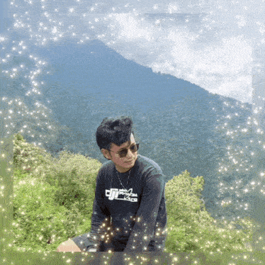a man wearing a black shirt that says dji