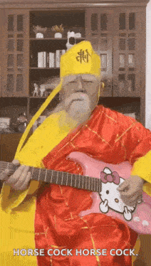 a man in a hello kitty costume is playing a guitar .