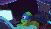 a cartoon of a teenage mutant ninja turtle looking at a laptop screen