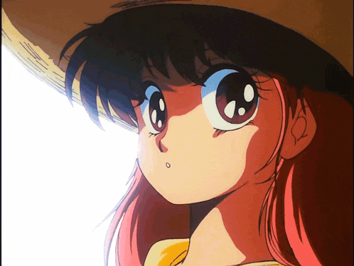 a girl with pink hair is wearing a hat