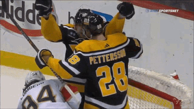 a hockey player with the number 28 on their jersey