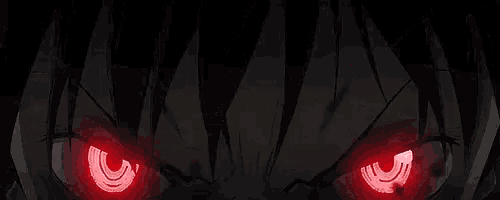 a close up of a person 's eyes with red lights on them .