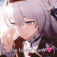 a close up of a anime girl with the words `` she loves nam '' written on the bottom