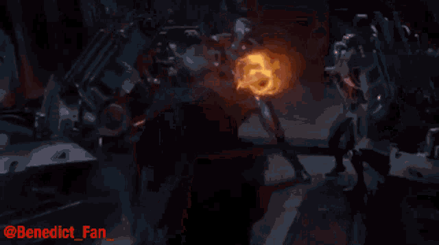 a group of people are standing in front of a circle of fire with the words " benedict fan " written on the bottom