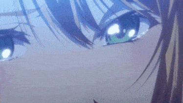 a close up of a person 's eye with tears running down it