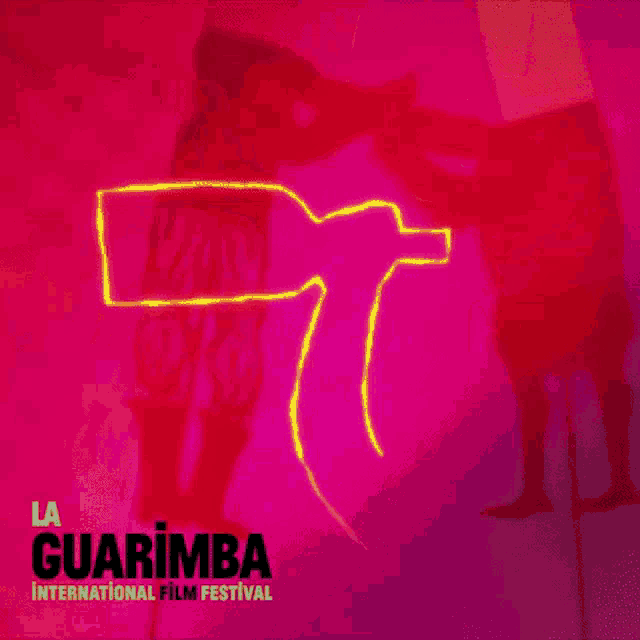 a poster for the guarimba international film festival with a person holding a green light