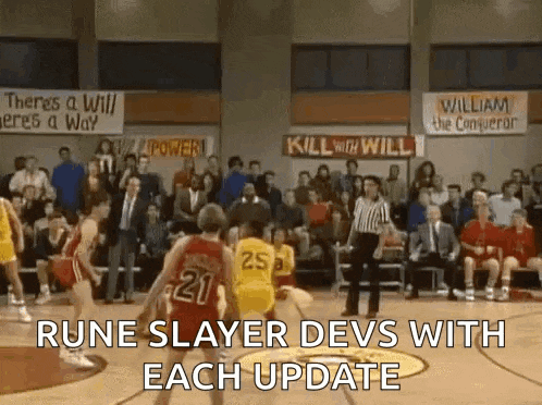 a basketball game is being played in front of a crowd in a gym .