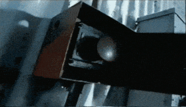 a close up of a traffic light with a white light on it