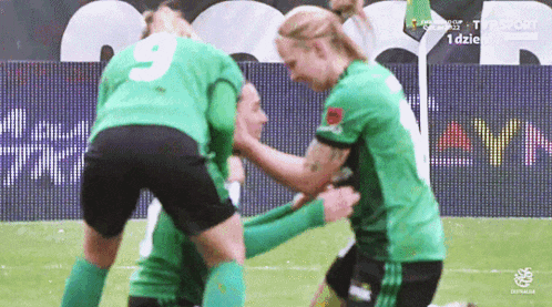 a soccer player with the number 9 on the back of her shirt
