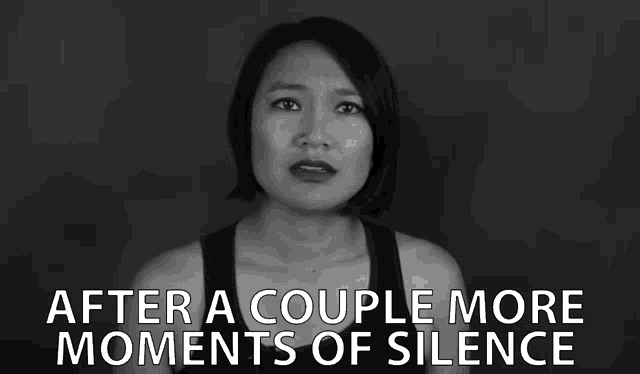 a black and white photo of a woman with the words after a couple more moments of silence below her