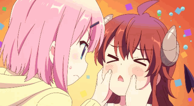 a girl with horns touches the face of another girl