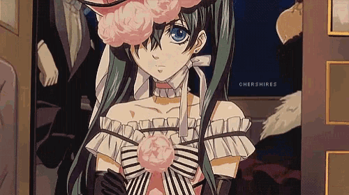 a girl with green hair and blue eyes is wearing a pink and black dress and a pink hat .