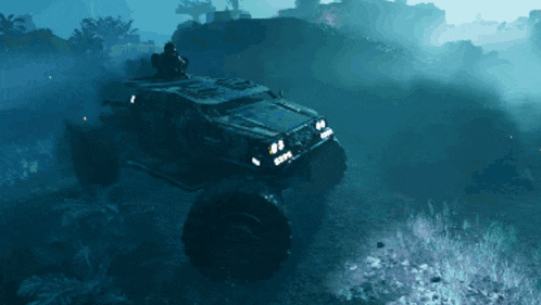 a military vehicle is driving through a foggy field