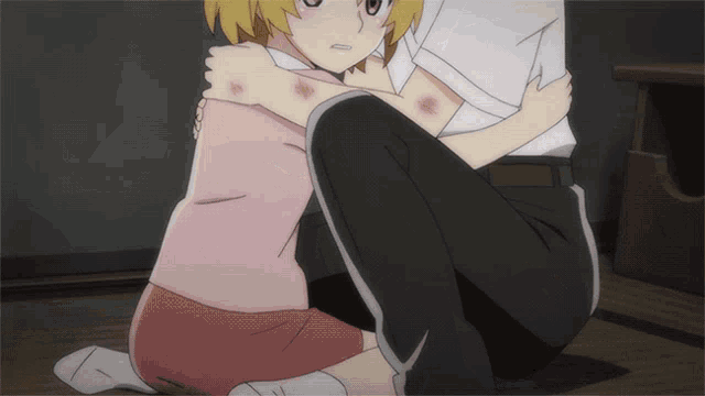 a man and a girl are hugging each other and the girl has a bruise on her arm